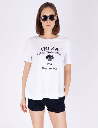 Fraternel Damen Ibiza Print T-Shirt – Lockeres Boho Hippie Shirt mit Muschel Print, Sommerliches Loose Fit Baumwollshirt T004
